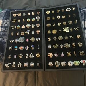 Gold and Silver Rings with Intricate Designs and Gemstones